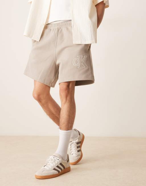 Calvin Klein Jeans applique logo jersey shorts in beige, 5 of 5