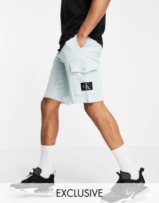 Calvin Klein Jeans Calvin Klein Jeans ASOS exclusive monogram badge shorts in blue