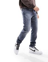 BOSS Orange Tatum BC-C tapered fit jeans in blue | ASOS