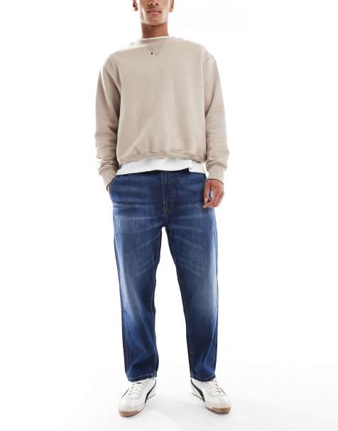 Calvin Klein Jeans – Avsmalnande jeans i 90-talsstil med mörk tvätt - view 1