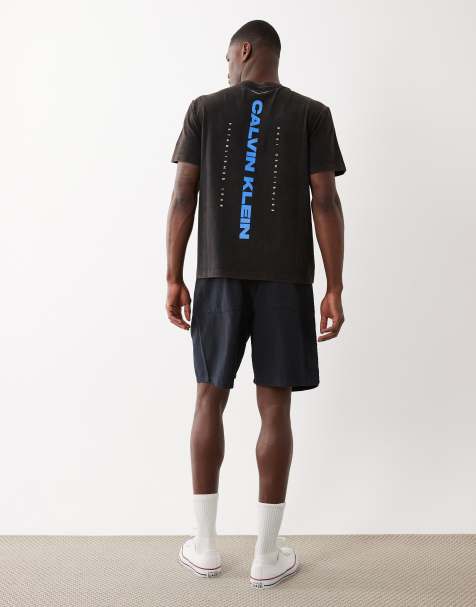 Calvin Klein Jeans back graphic centre logo graphic t-shirt in washed black and blue - view 1