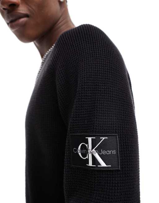Calvin Klein Jeans badge jumper in black ASOS