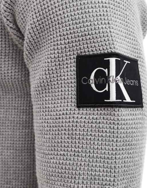 Calvin Klein Jeans badge jumper in grey ASOS