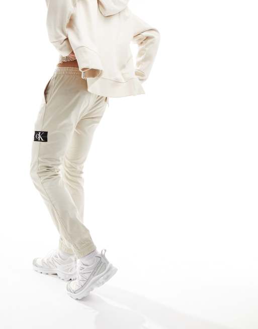 Calvin Klein Jeans badge logo casual chinos in beige