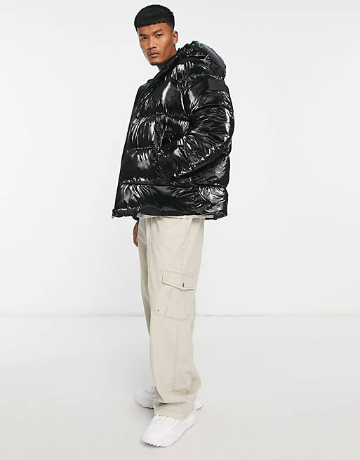 Calvin Klein Jeans badge logo high shine oversized puffer jacket in black |  ASOS