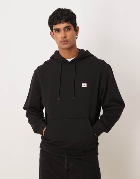 Calvin Klein Jeans Badge Logo hoodie in black - view 1