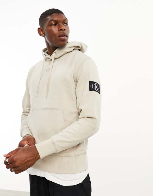 Calvin Klein Jeans badge logo hoodie in taupe ASOS