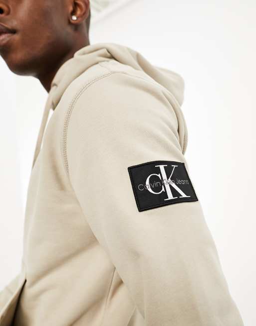 Calvin Klein Jeans badge logo hoodie in taupe