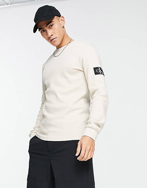Calvin Klein Jeans badge logo long sleeve t-shirt in beige | ASOS