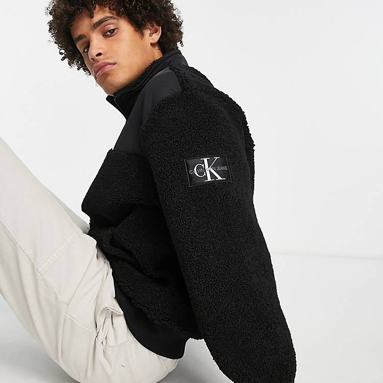 Calvin Klein Jeans badge logo sherpa borg half zip sweatshirt in black |  ASOS