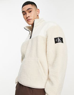 Calvin Klein Jeans badge logo sherpa borg half zip sweatshirt in off-white-Neutral