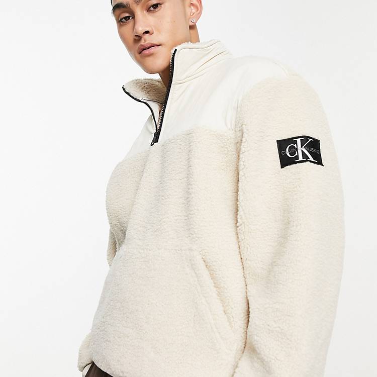 Calvin Klein Jeans badge logo sherpa borg half zip sweatshirt in off white  | ASOS