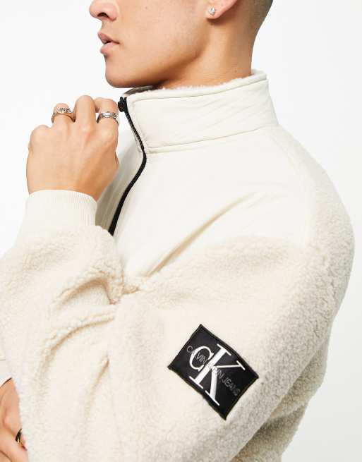 Calvin Klein Jeans badge logo sherpa borg half zip sweatshirt in off-white  | ASOS