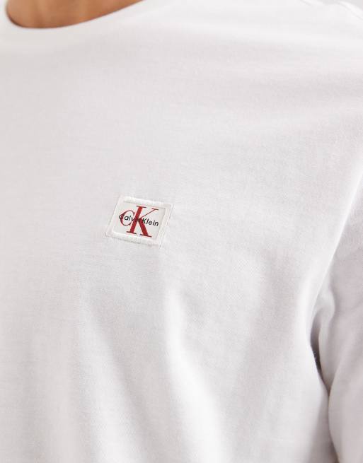 Calvin Klein Jeans badge logo t-shirt in white , 5 of 5