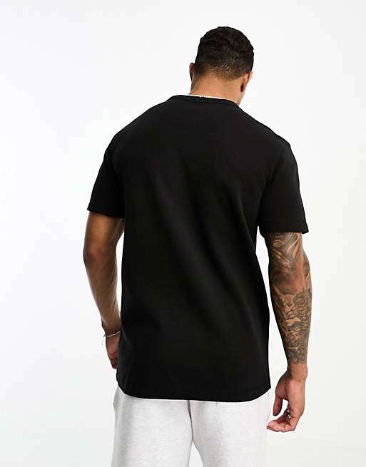 Calvin Klein Jeans badge logo waffle short sleeve T-shirt in black | ASOS