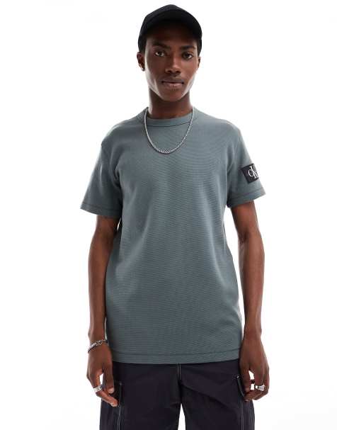 Calvin Klein Jeans badge logo waffle t-shirt in charcoal grey - view 1