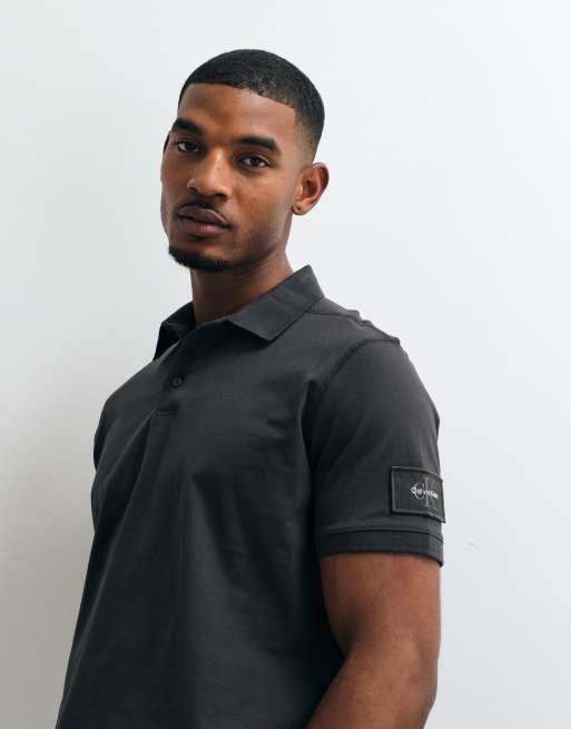 Calvin Klein Jeans badge polo shirt in black, 3 of 5