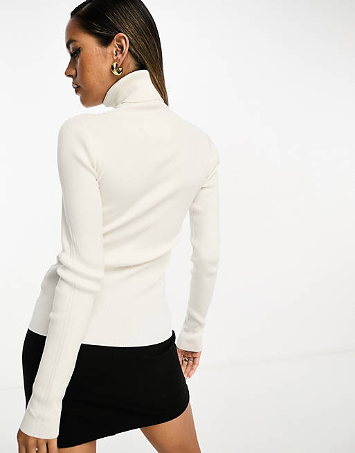 Calvin Klein Jeans badge roll neck sweater in white | ASOS