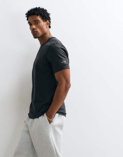 Calvin Klein Jeans badge t-shirt in black - view 1