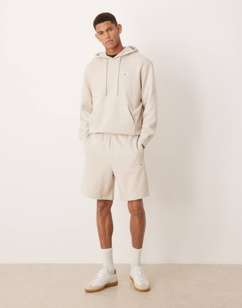 Calvin Klein Jeans badge terry shorts in cream - view 1