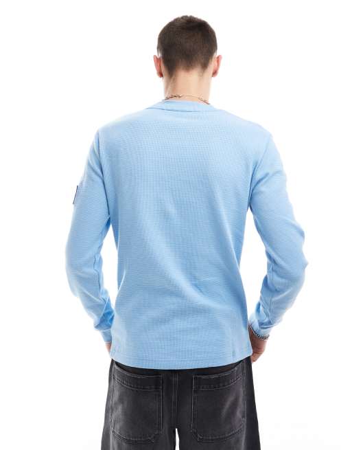 Calvin Klein Jeans badge waffle long sleeve t-shirt in blue