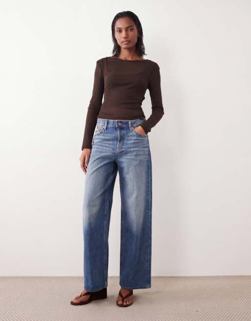 Calvin Klein Jeans – Baggy-Jeans in mittelblauer Vintage-Waschung mit niedrigem Bund