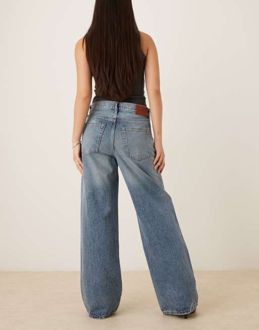 Calvin Klein Jeans – Baggy-Jeans in mittelblauer Waschung mit Used-Optik und niedrigem Bund, 2 von 5