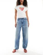 Weekday Missy low waist loose fit jeans in dark blue wash with green tint