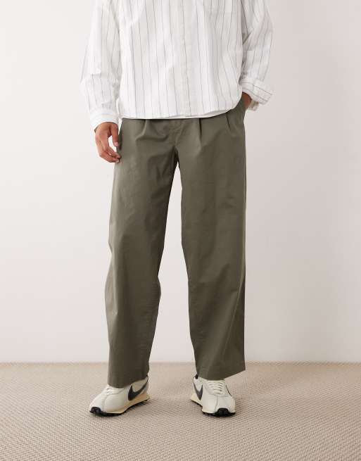 Calvin Klein Jeans – Baumwollhose in Olivgrün mit Bundfalten, 5 von 5