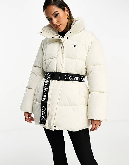 Calvin Klein Jeans belted long puffer jacket in white | ASOS
