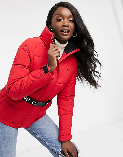Calvin Klein Jeans belted waist padded jacket in red | ASOS
