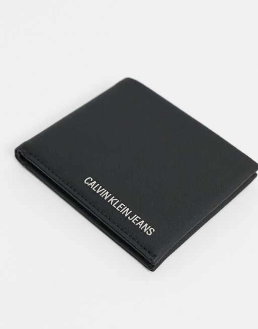 Calvin Klein Jeans bi-fold wallet in black leather | ASOS