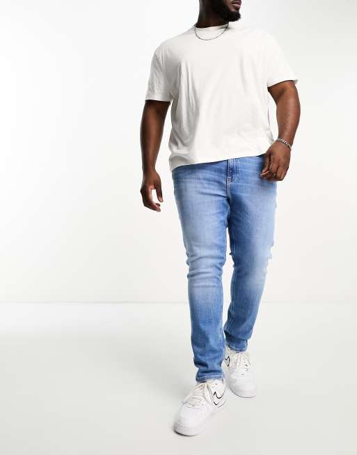 Calvin Klein Jeans Big & Tall – Niebieskie jeansy o obcisłym kroju z efektem sprania