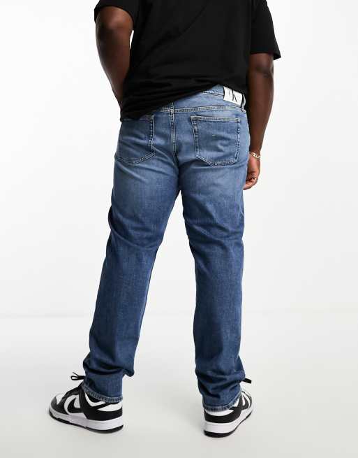 Calvin Klein Jeans Big Tall regular tapered jeans in mid wash ASOS