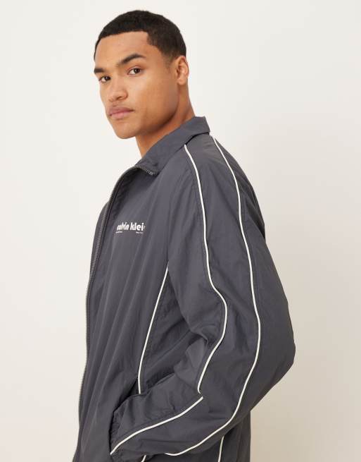 Calvin Klein Jeans - Blå jakke med almindelig krave og hvide detaljer , 4 af 5