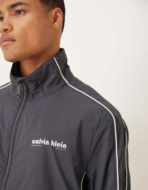 Calvin Klein Jeans - Blå jakke med almindelig krave og hvide detaljer , 5 af 5