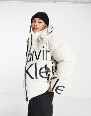 Calvin Klein Jeans bold disrupted logo hooded puffer jacket in eggshell