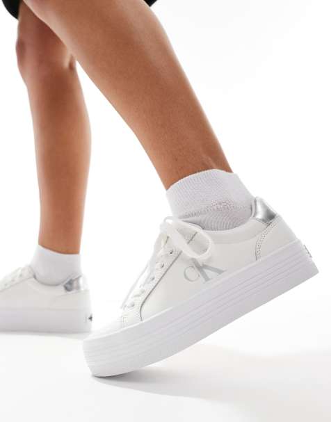Calvin Klein Jeans bold flatform lace up sneakers in white & silver - view 1