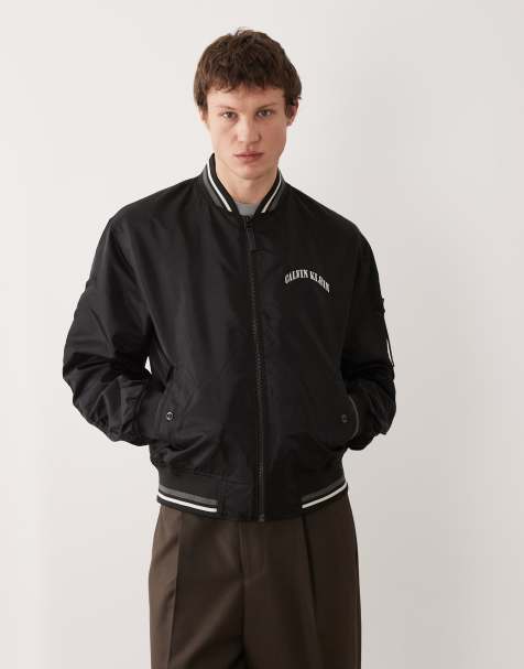 Calvin Klein Jeans – Bomberjacke aus Nylon in Schwarz mit gestreiftem Kragen und Grafik - view 1