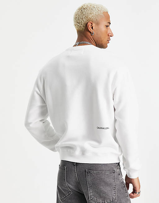 Calvin Klein Jeans branded graphic logo sweatshirt in white | ASOS