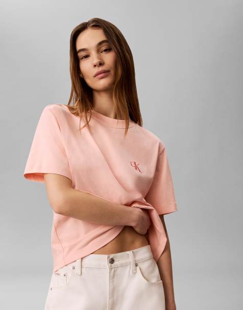 Calvin Klein Jeans – Brzoskwiniowy T-shirt o pudełkowym kroju - view 1