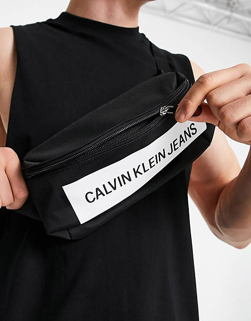 Calvin Klein Jeans bum bag with panel logo in black | ASOS
