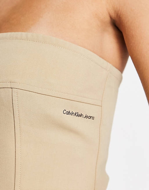 Calvin Klein Jeans bustier corset top in beige | ASOS