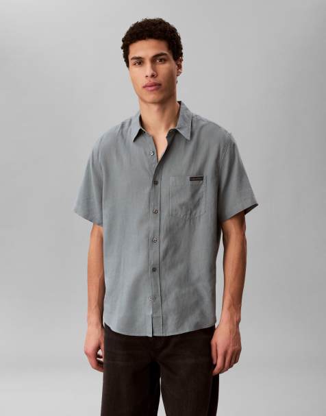 Calvin Klein Jeans - Camicia casual a maniche corte in lino verde slavato - view 1