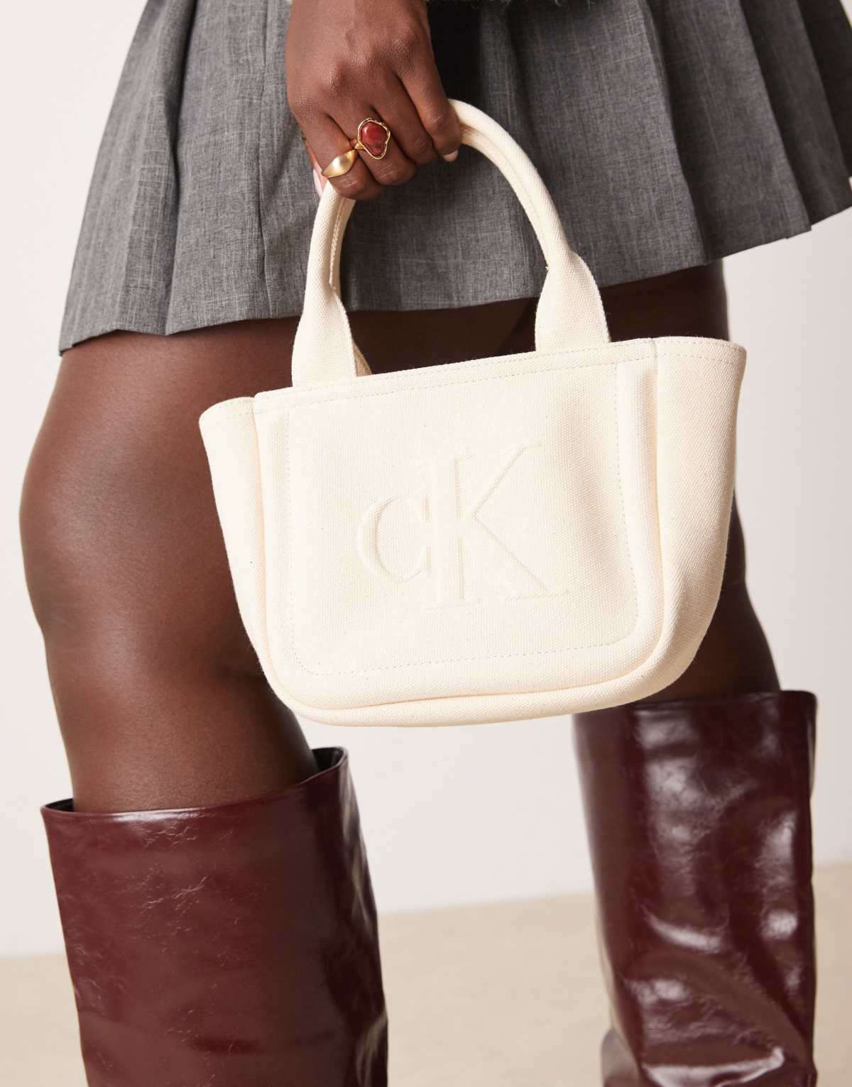 Calvin Klein Jeans canvas mini tote bag in off white