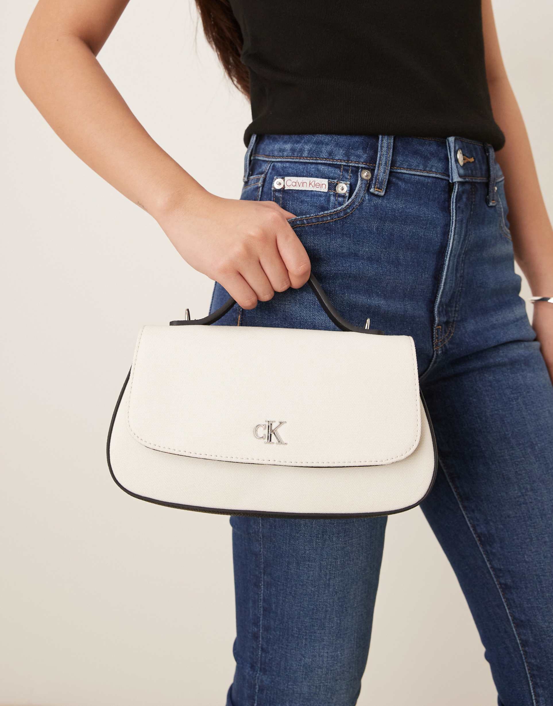 calvin klein jeans canvas top handle purse in white