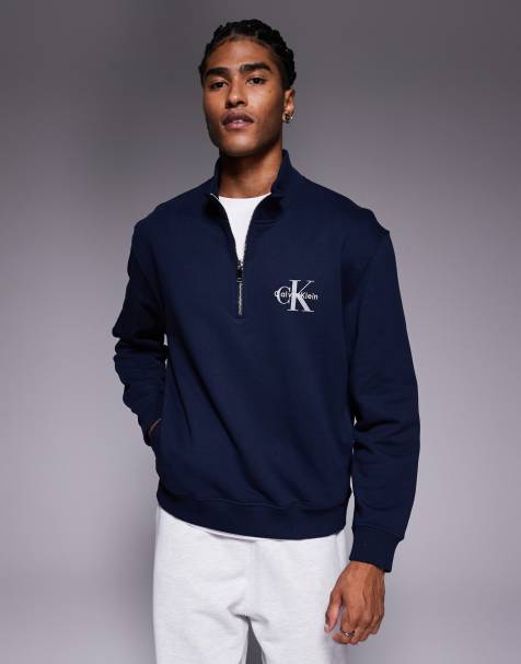 Calvin Klein Jeans chest logo 1/4 zip sweatshirt in navy - view 1