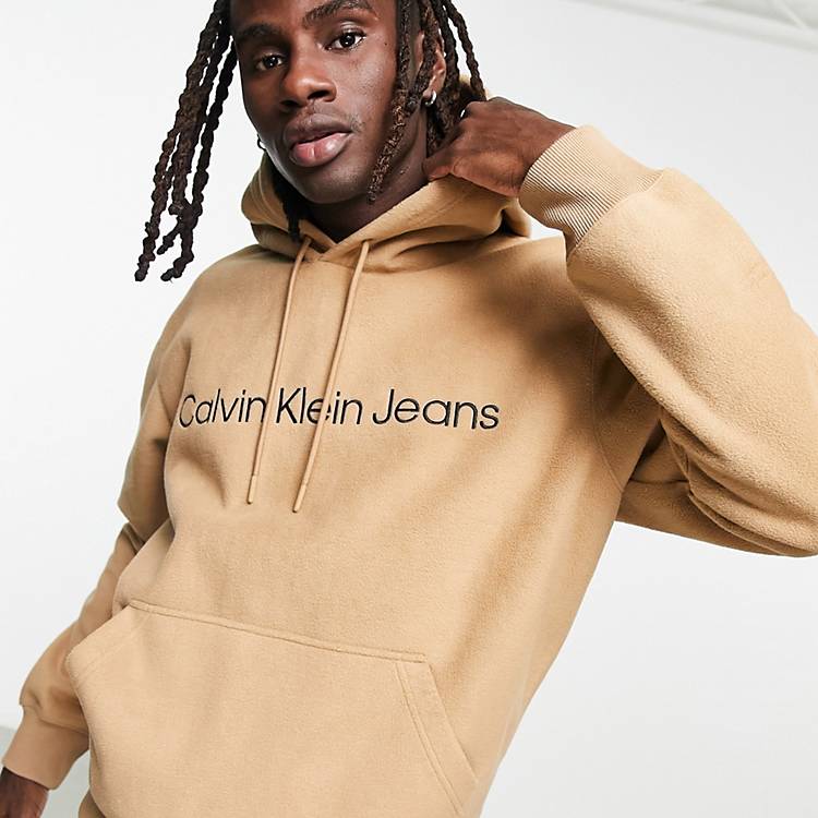 Calvin Klein Jeans chest logo heavy double face polar fleece hoodie in  camel | ASOS