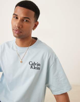 Футболка с логотипом Calvin Klein Jeans на груди бледно-голубого цвета