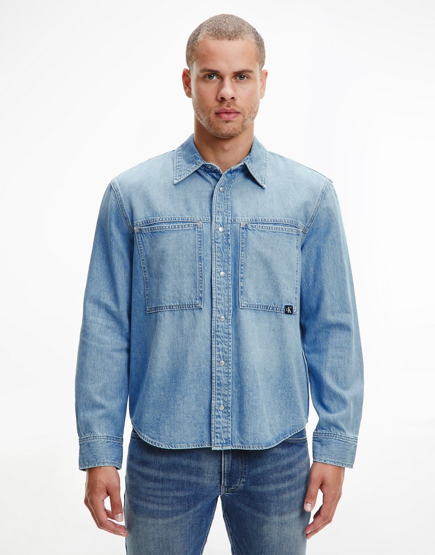 Calvin Klein Jeans chest pocket denim shirt in light wash-Blue